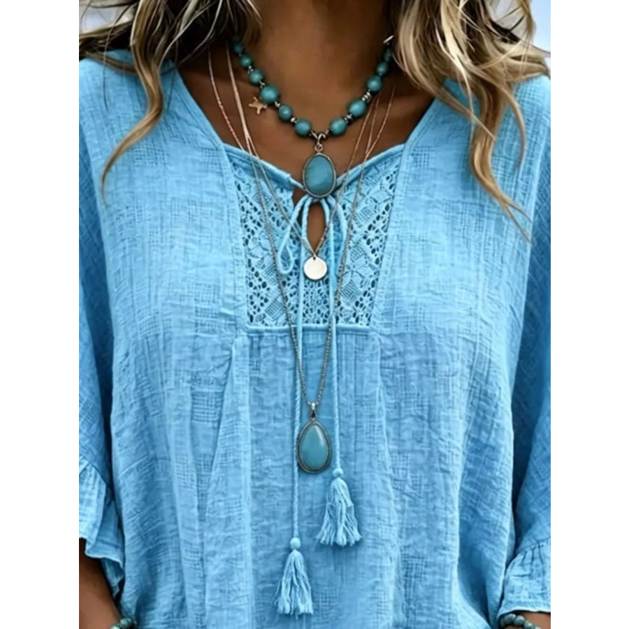Full Size Tassel Tie Neck Ruffled Hem Blouse Plus Apparel and Accessories