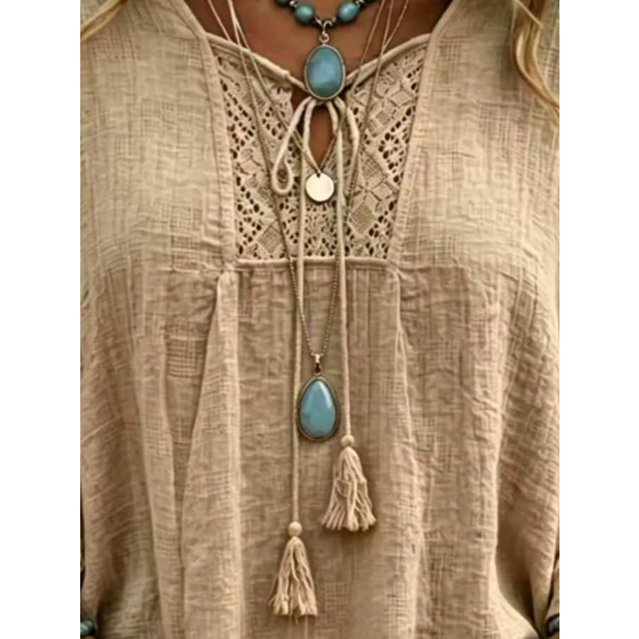 Full Size Tassel Tie Neck Ruffled Hem Blouse Plus Apparel and Accessories