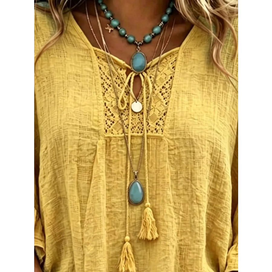 Full Size Tassel Tie Neck Ruffled Hem Blouse Plus Apparel and Accessories