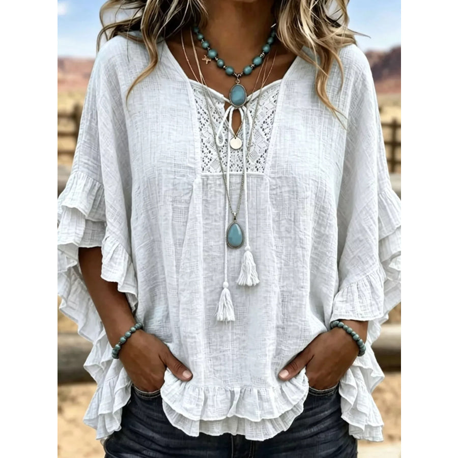Full Size Tassel Tie Neck Ruffled Hem Blouse Plus White / S Apparel and Accessories