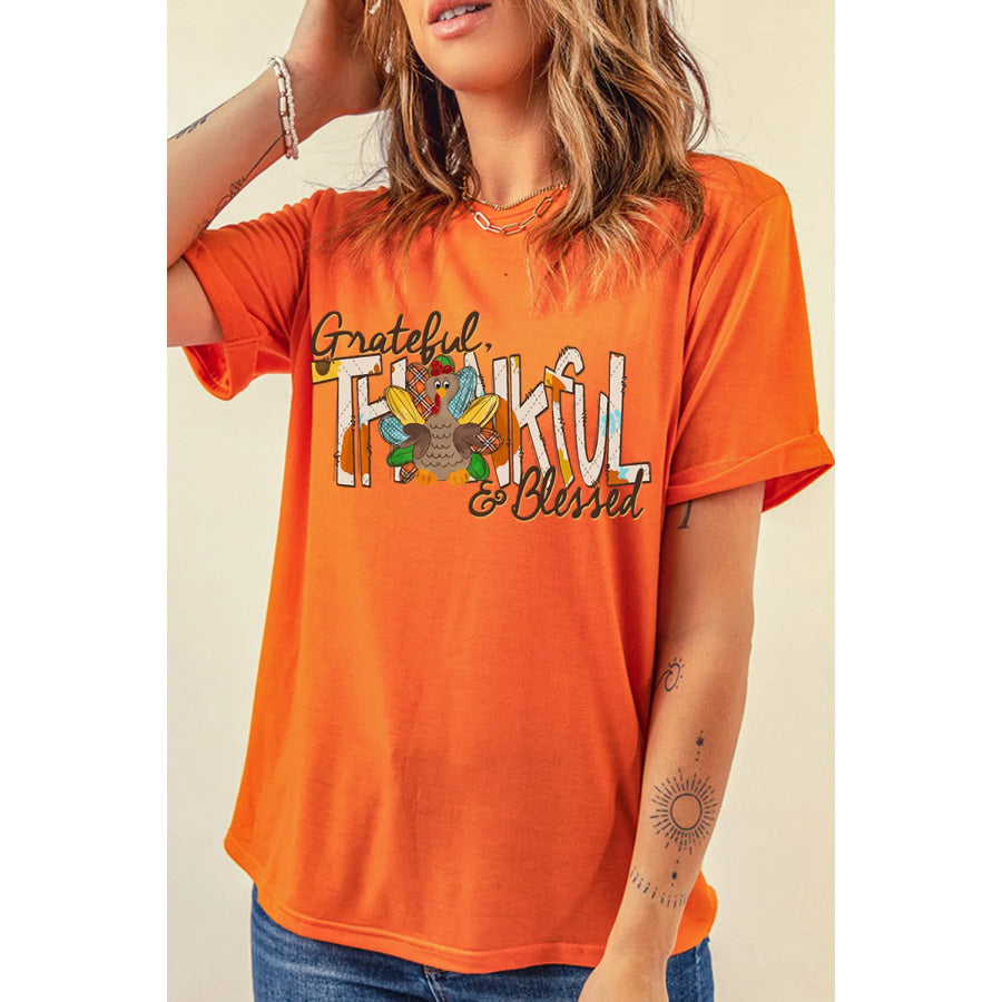 Graphic Round Neck Short Sleeve T-Shirt Orange / S Apparel and Accessories