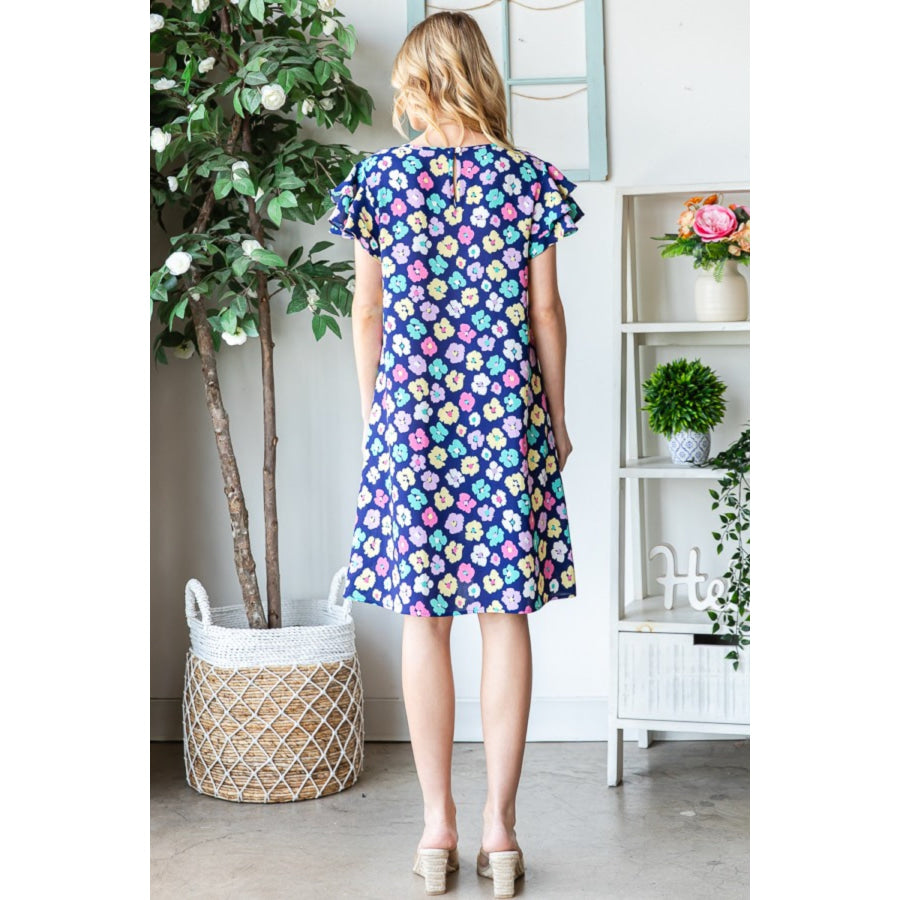 Heimish Full Size Floral Ruffled Short Sleeve Dress with Pockets Apparel and Accessories