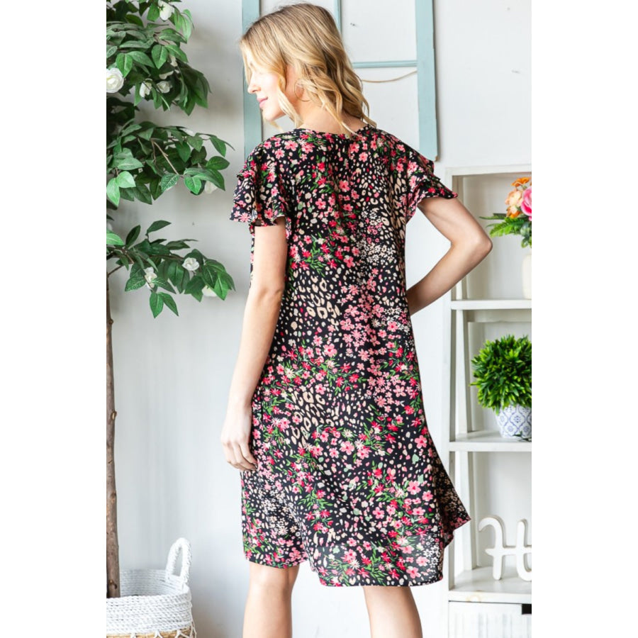 Heimish Full Size Printed Ruffled Short Sleeve Dress with Pockets Black / S Apparel and Accessories