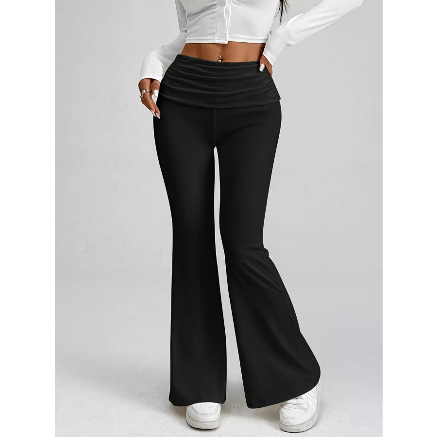 High-Waisted Polka Dot Flare Pants Black / XS Apparel and Accessories