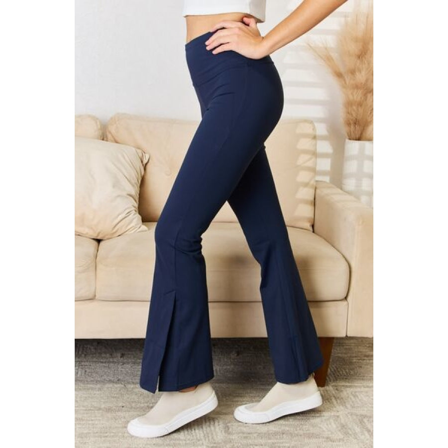 Kimberly C Full Size Wide Waistband Slit Flare Pants Apparel and Accessories