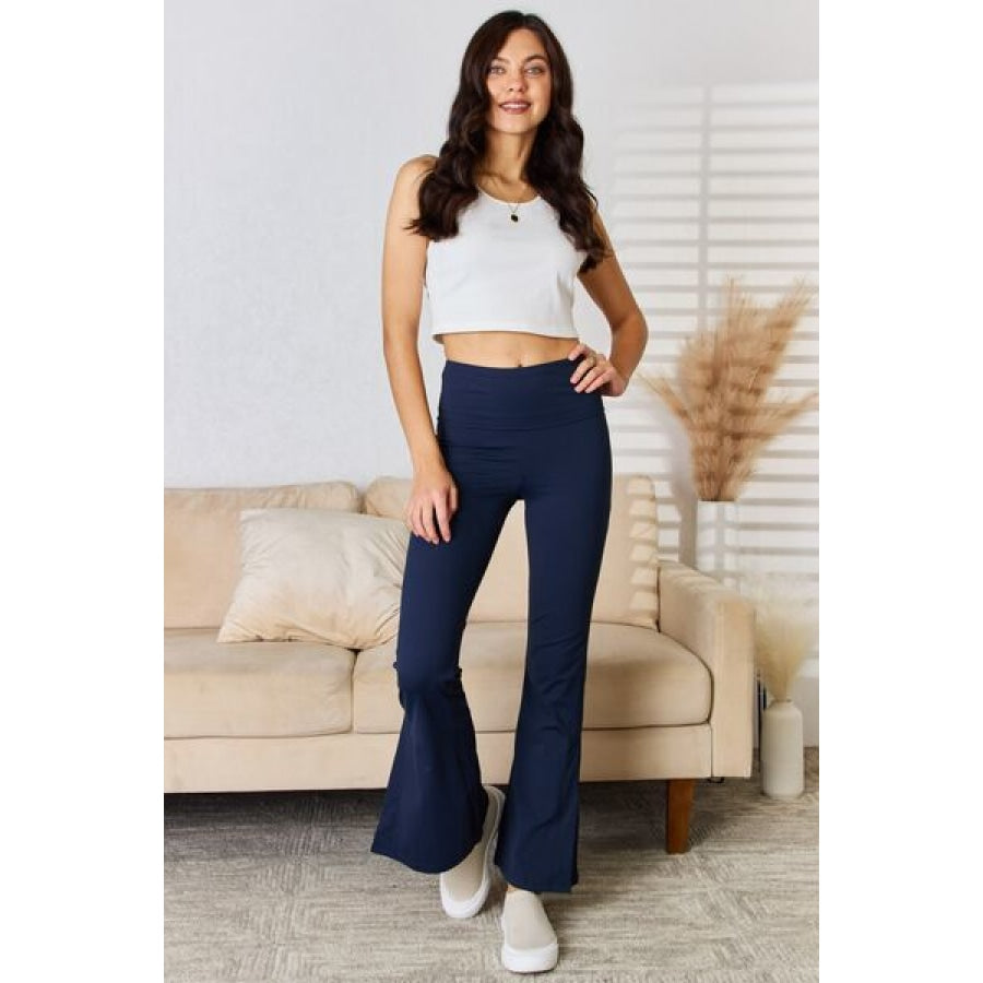 Kimberly C Full Size Wide Waistband Slit Flare Pants Apparel and Accessories