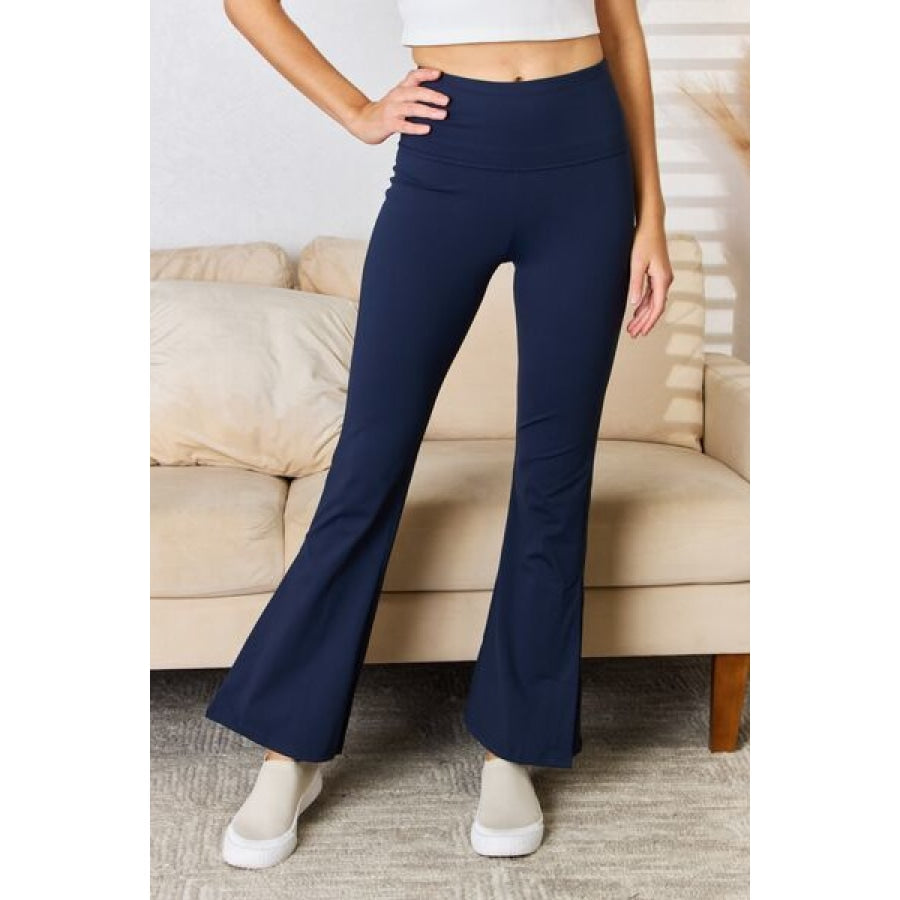 Kimberly C Full Size Wide Waistband Slit Flare Pants Navy / S Apparel and Accessories