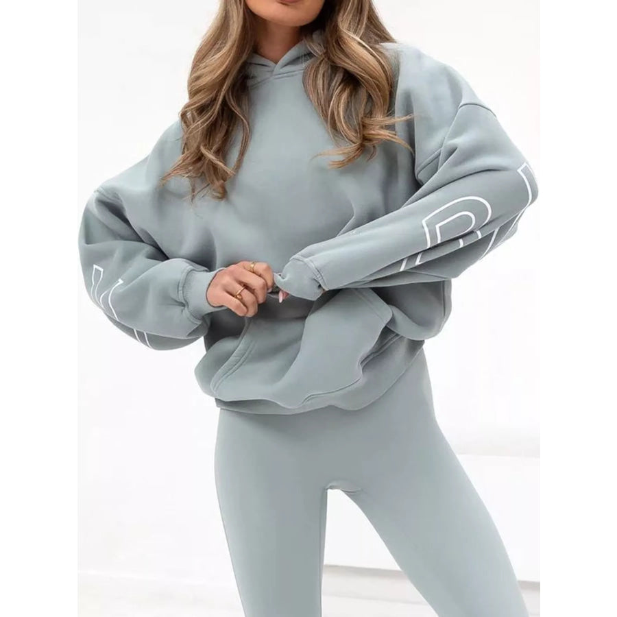 Letter Back Hoodie with Kangaroo Pocket Light Blue / S Apparel and Accessories