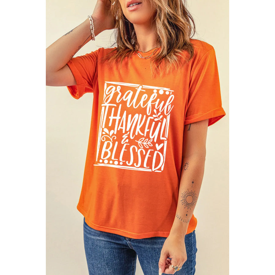 Letter Graphic Round Neck Short Sleeve T-Shirt Orange / S Apparel and Accessories