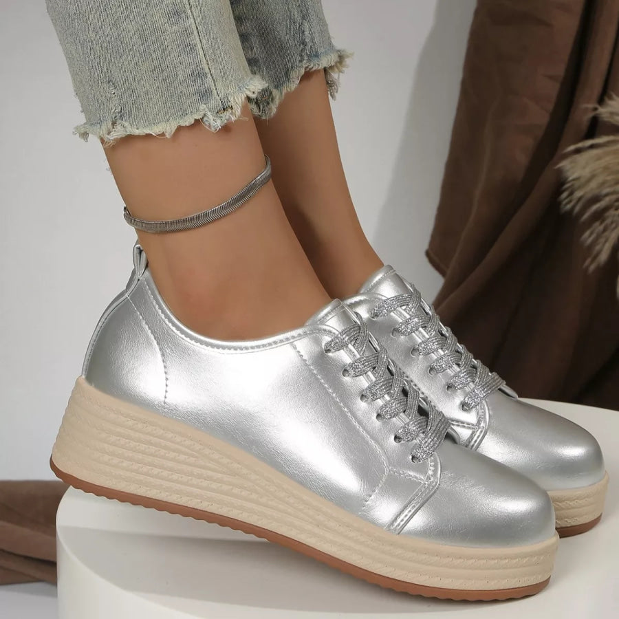 Metallic Platform Sneakers with Height-Increasing Sole Apparel and Accessories