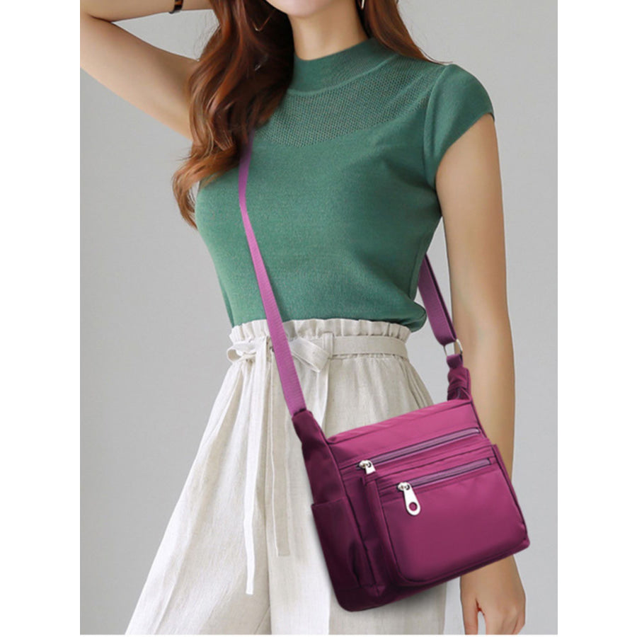 Multi-Pocket Lightweight Nylon Crossbody Bag Red-Violet / One Size Apparel and Accessories