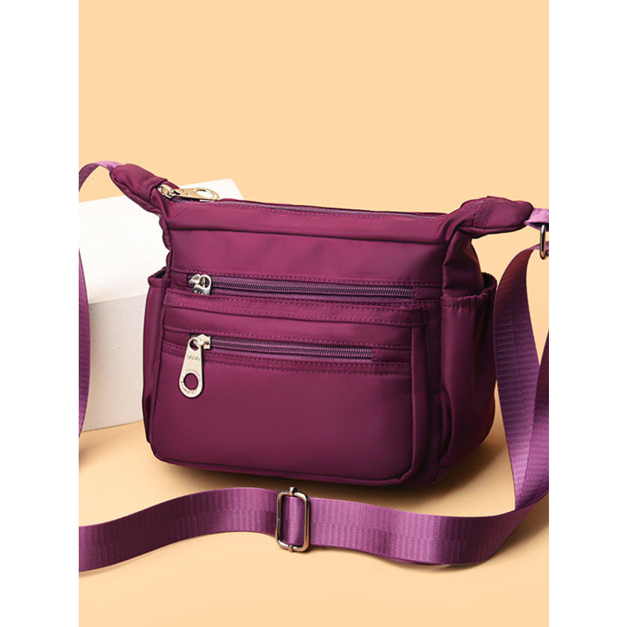Multi-Pocket Lightweight Nylon Crossbody Bag Red-Violet / One Size Apparel and Accessories