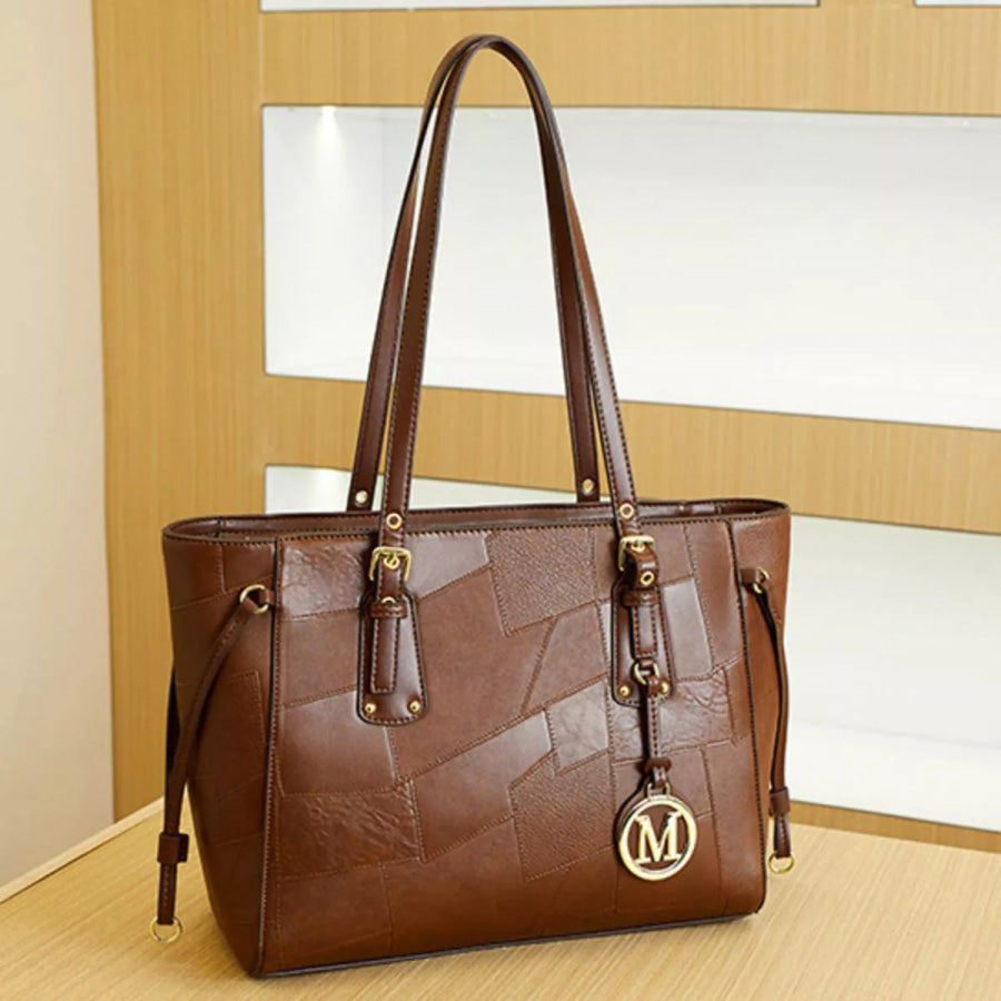 Patchwork Leather Tote Bag with Gold Logo Charm Brown / onesize Apparel and Accessories