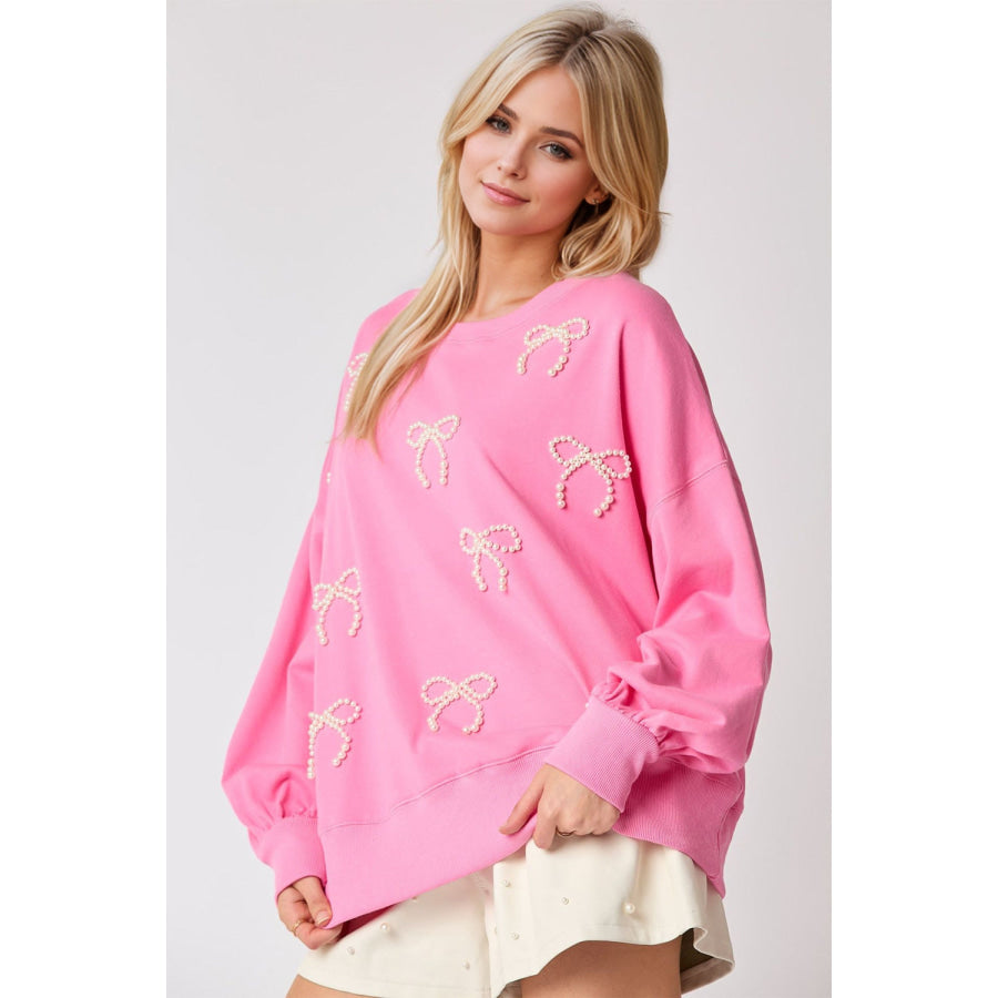 Pearl Bow Round Neck Dropped Shoulder Sweatshirt Pink / S Apparel and Accessories