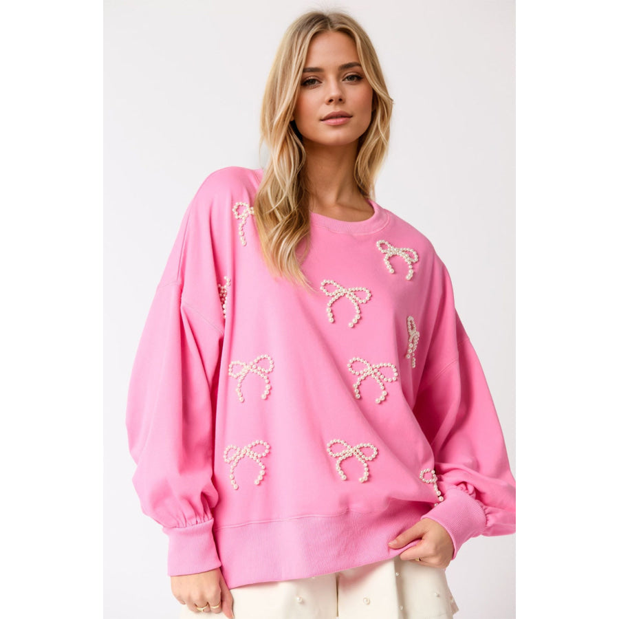 Pearl Bow Round Neck Dropped Shoulder Sweatshirt Pink / S Apparel and Accessories