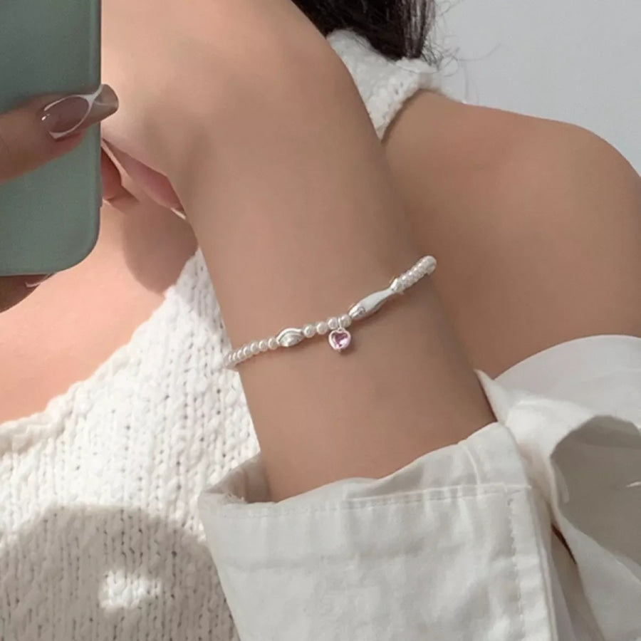 Pearl Fish Bracelet with Heart Charm Cream / One Size Apparel and Accessories