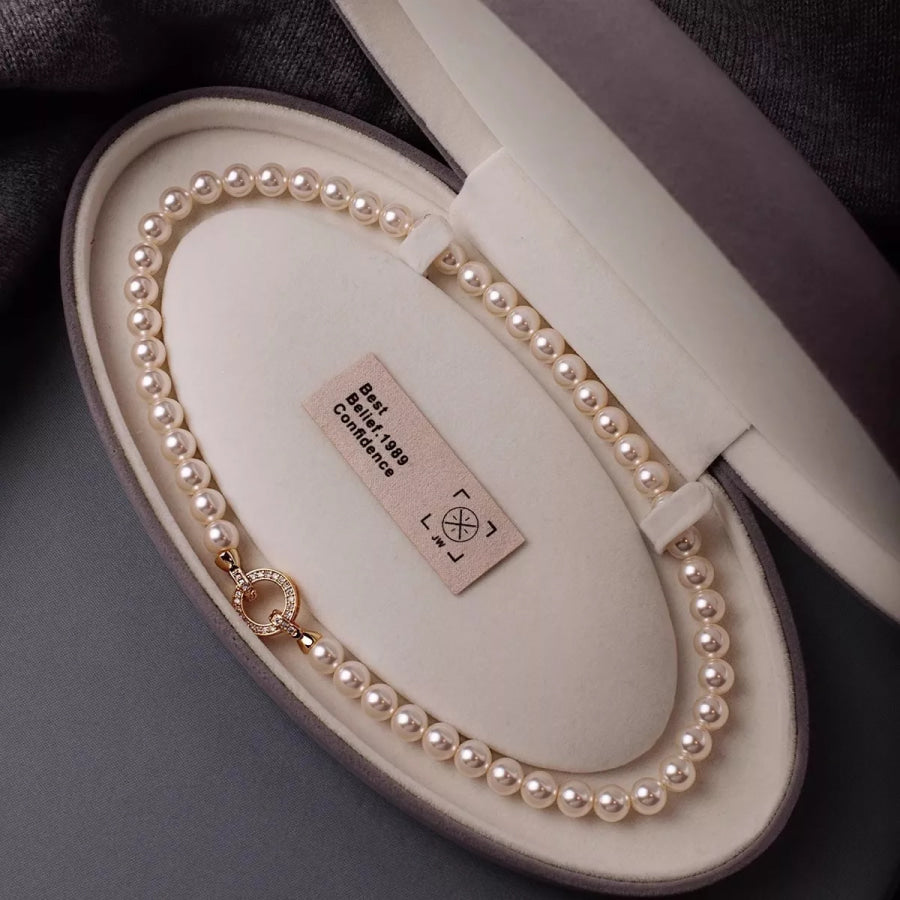 Pearl Necklace with Interlocking Clasp Cream / One Size Apparel and Accessories