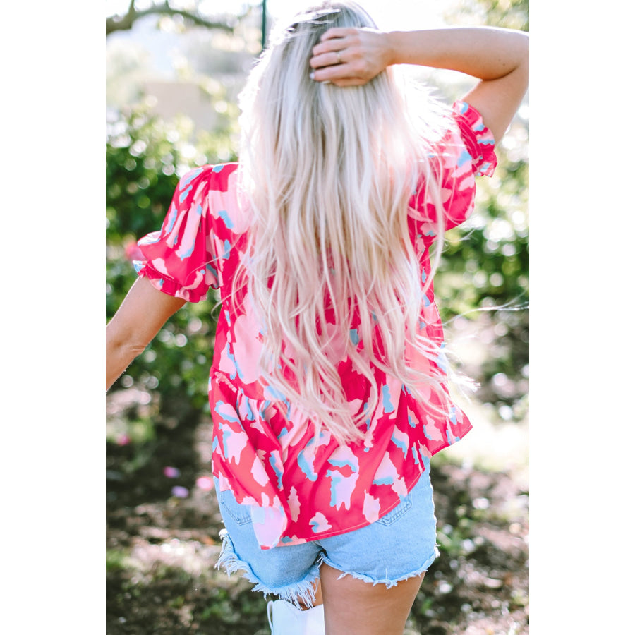 Peplum Printed Notched Short Sleeve Blouse Apparel and Accessories