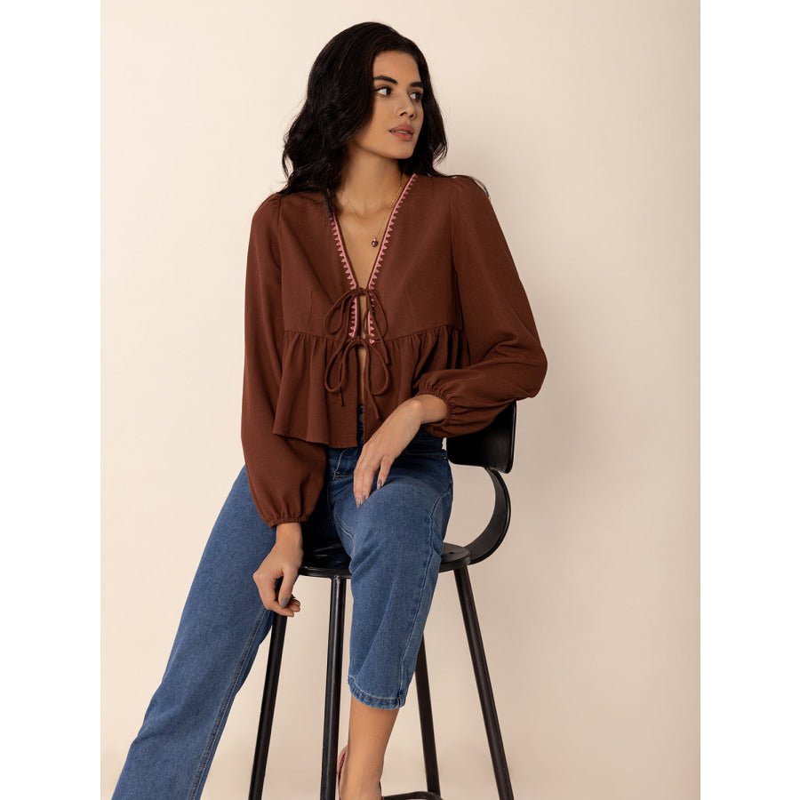 Peplum Tied V-Neck Long Sleeve Blouse Apparel and Accessories