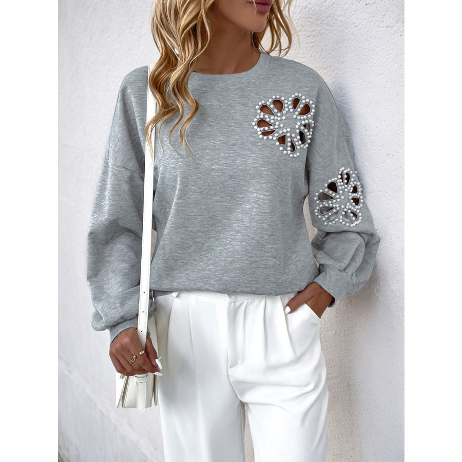 Perfee Cutout Pearl Round Neck Long Sleeve Sweatshirt Apparel and Accessories