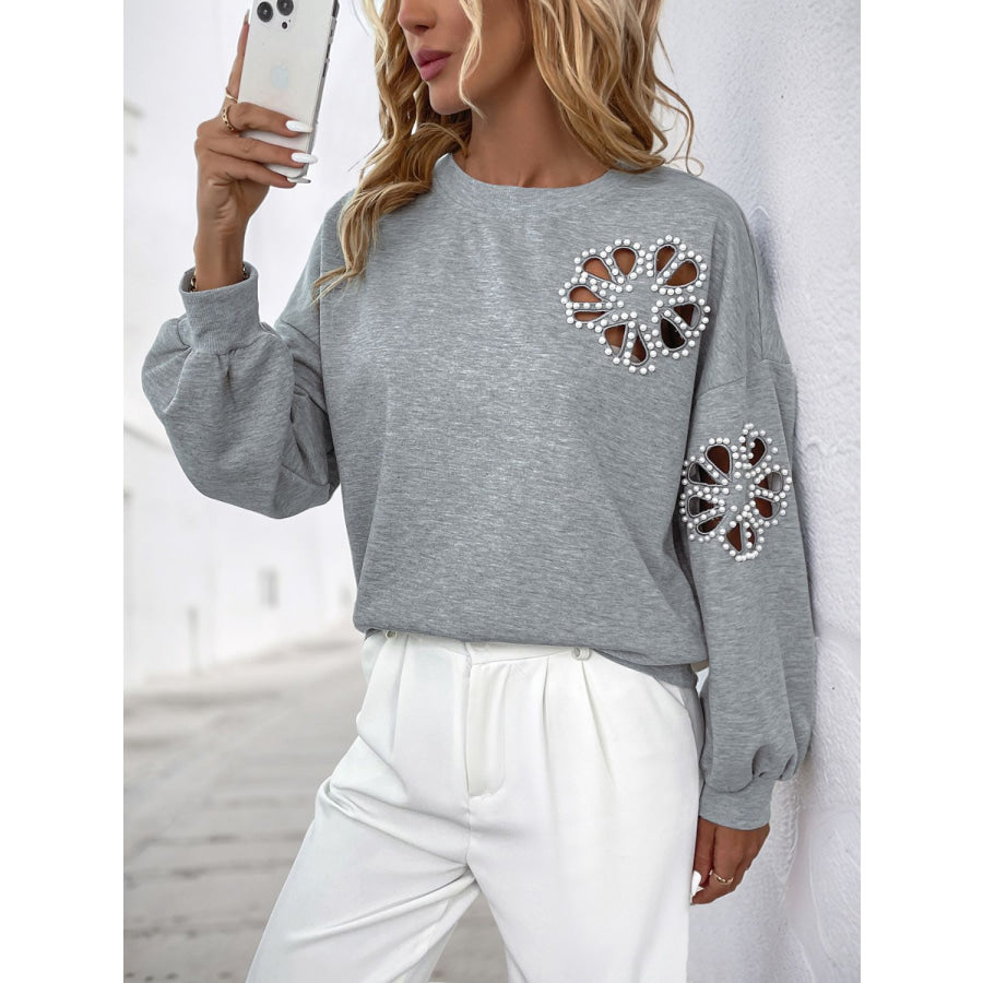 Perfee Cutout Pearl Round Neck Long Sleeve Sweatshirt Apparel and Accessories