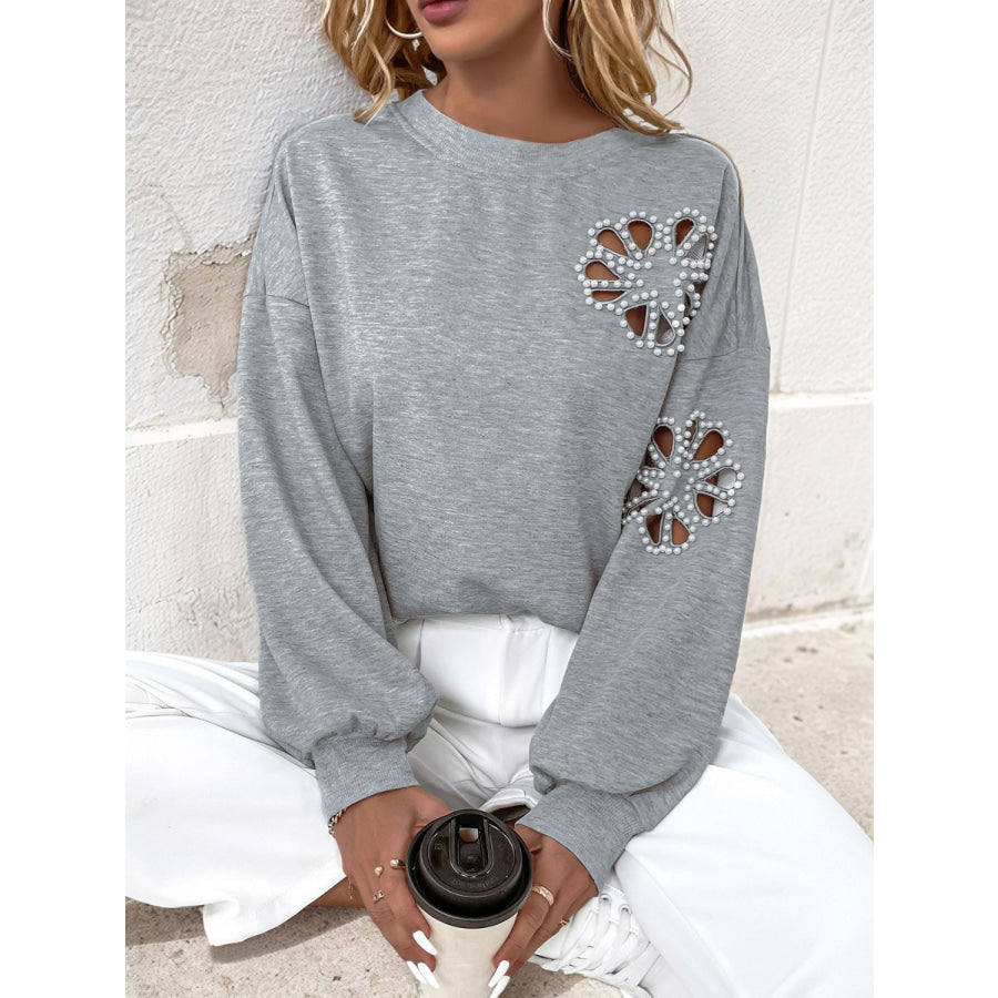 Perfee Cutout Pearl Round Neck Long Sleeve Sweatshirt Apparel and Accessories