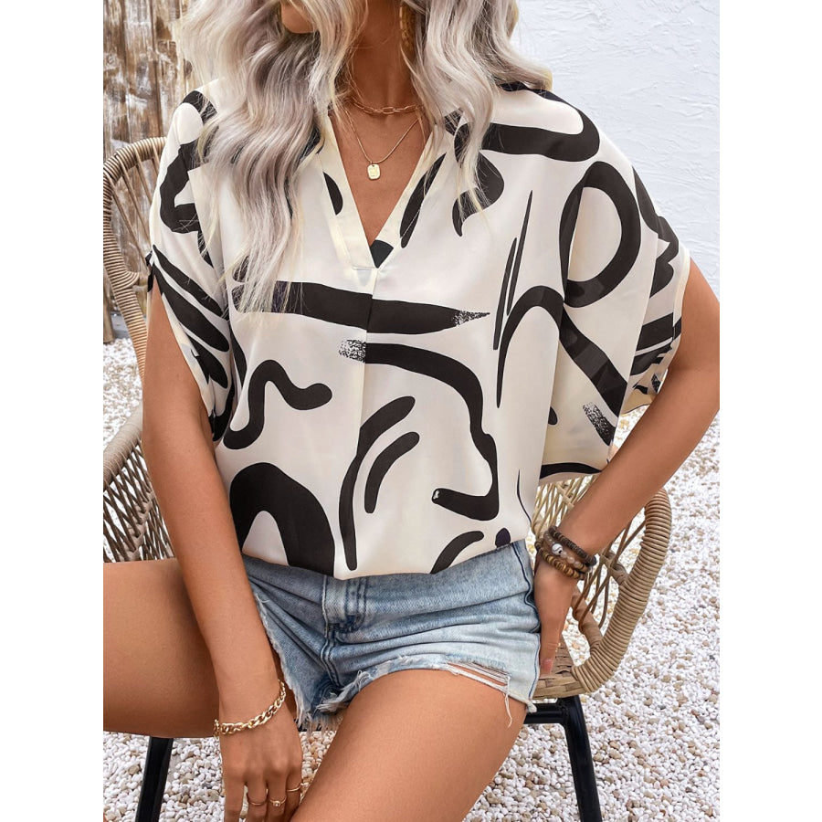 Perfee Printed Notched Half Sleeve Blouse Apparel and Accessories