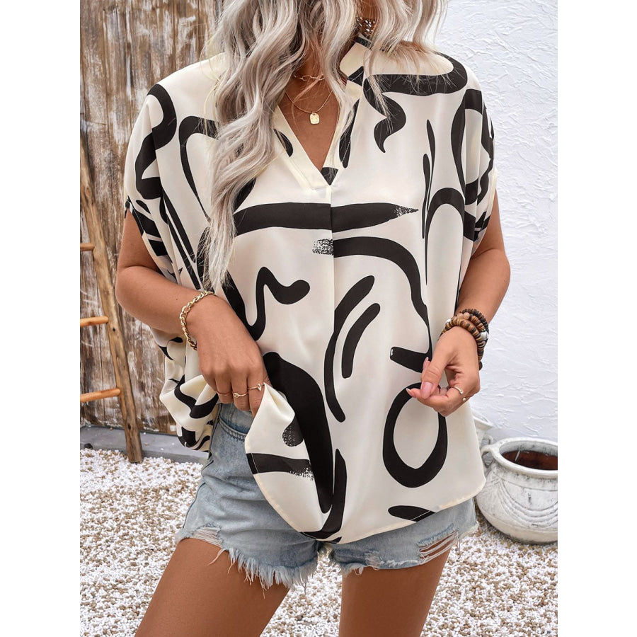 Perfee Printed Notched Half Sleeve Blouse Apparel and Accessories