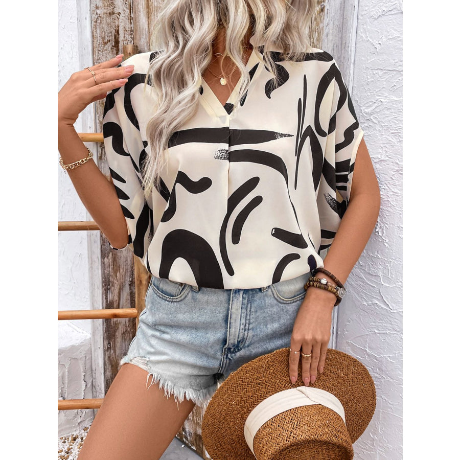 Perfee Printed Notched Half Sleeve Blouse Apparel and Accessories