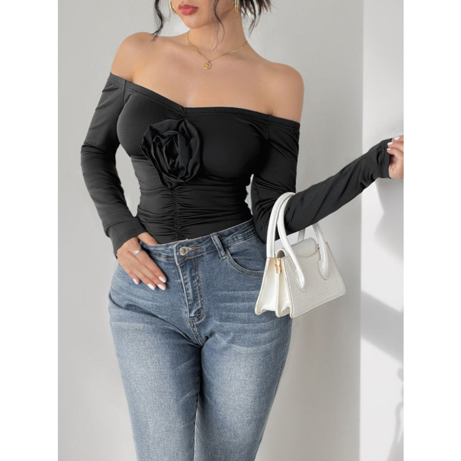 Perfee Ruched Flower Off-Shoulder Long Sleeve Bodysuit Black / S Apparel and Accessories