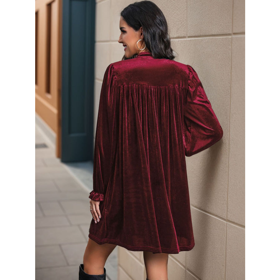 Perfee Ruched Surplice Long Sleeve Mini Dress Apparel and Accessories