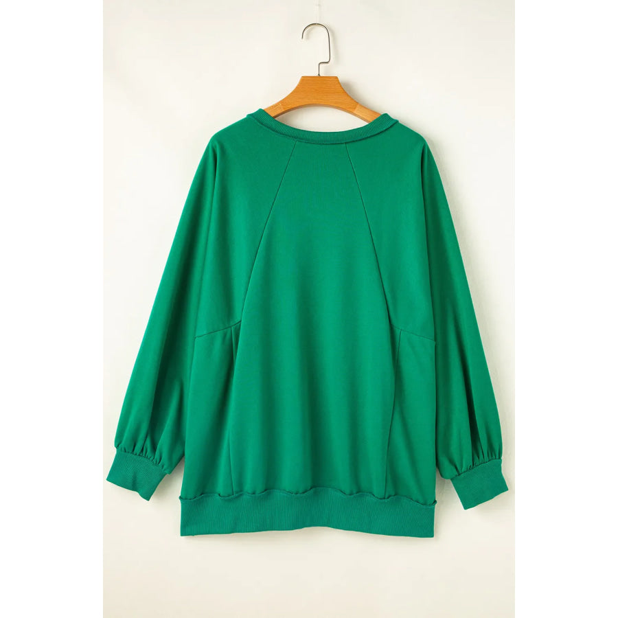 Plus Size Cutout Hem Notched Long Sleeve Sweatshirt Apparel and Accessories