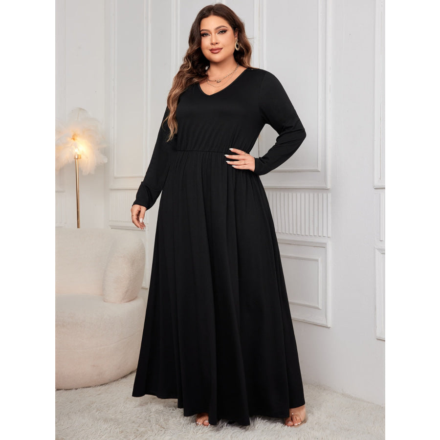 Plus Size Cutout V-Neck Long Sleeve Maxi Dress Black / 1XL Apparel and Accessories