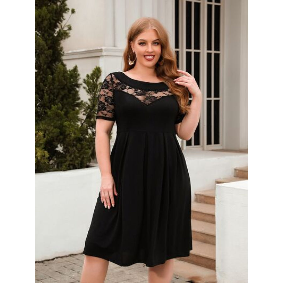 Plus Size Ruched Round Neck Short Sleeve Dress Black / 1XL Apparel and Accessories