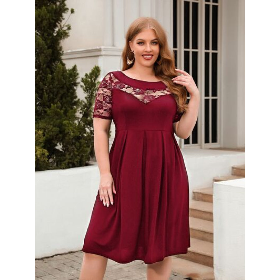 Plus Size Ruched Round Neck Short Sleeve Dress Wine / 1XL Apparel and Accessories