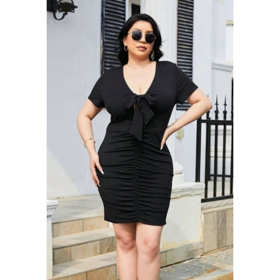 Plus Size Ruched Tied Short Sleeve Mini Dress Black / 1XL Apparel and Accessories