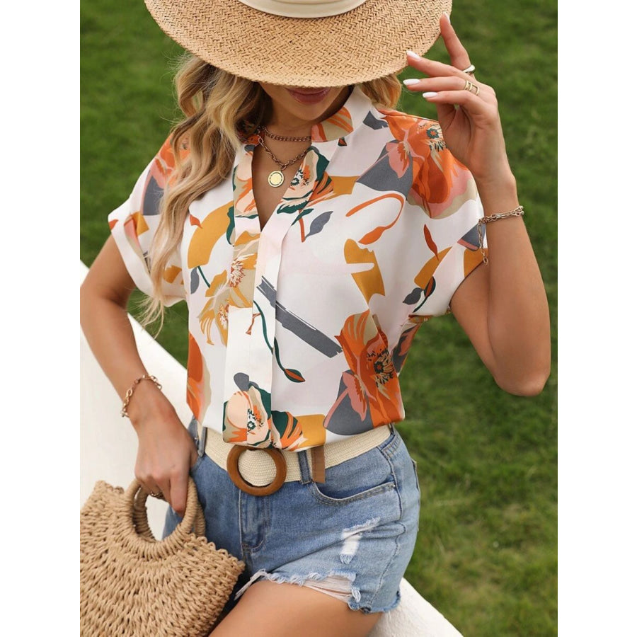 Printed Notched Short Sleeve Blouse Apparel and Accessories