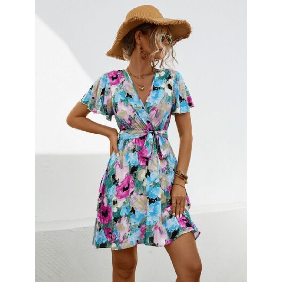 Printed Surplice Tie Waist Mini Dress Pastel Blue / S Apparel and Accessories