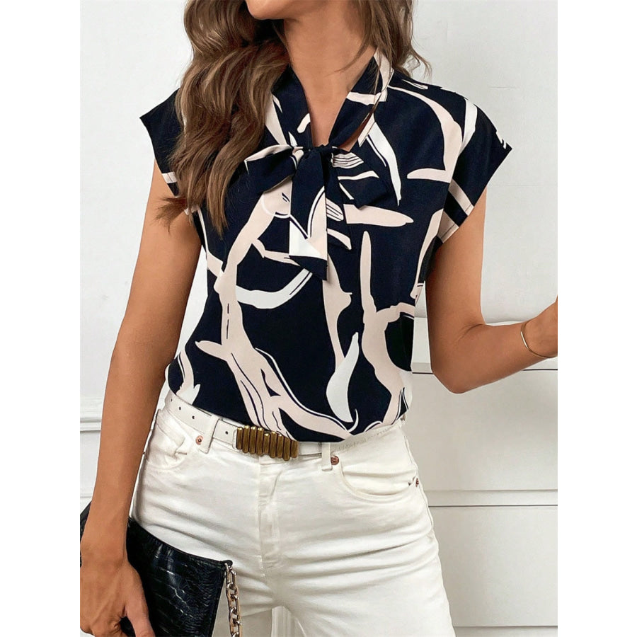 Printed Tie Neck Cap Sleeve Blouse Apparel and Accessories