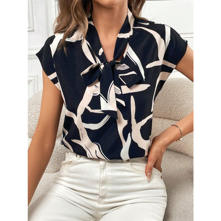 Printed Tie Neck Cap Sleeve Blouse Apparel and Accessories