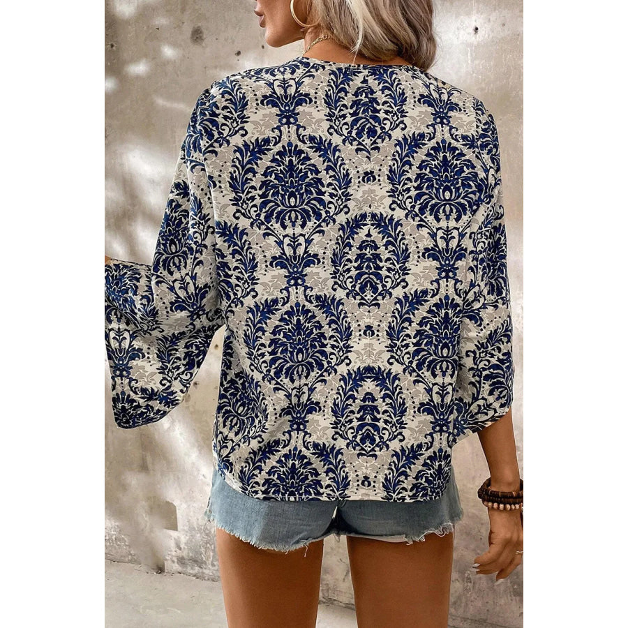 Printed V-Neck Three-Quarter Sleeve Blouse Apparel and Accessories