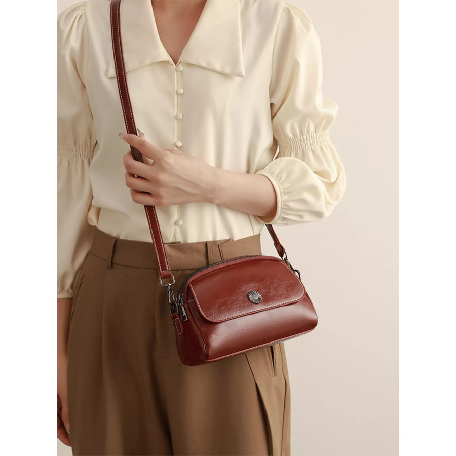 PU Leather Crossbody Bag with Metal Emblem Detail Brown / onesize Apparel and Accessories