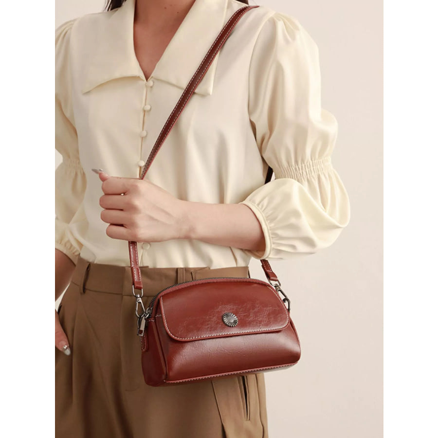 PU Leather Crossbody Bag with Metal Emblem Detail Brown / onesize Apparel and Accessories