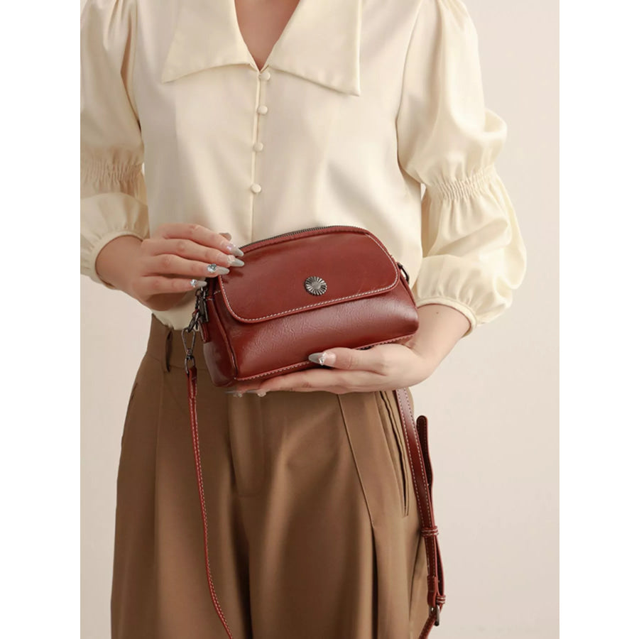 PU Leather Crossbody Bag with Metal Emblem Detail Brown / onesize Apparel and Accessories