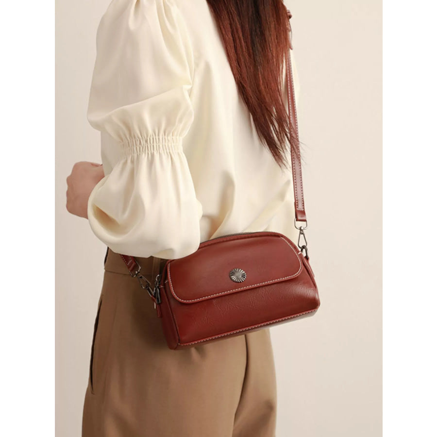 PU Leather Crossbody Bag with Metal Emblem Detail Brown / onesize Apparel and Accessories