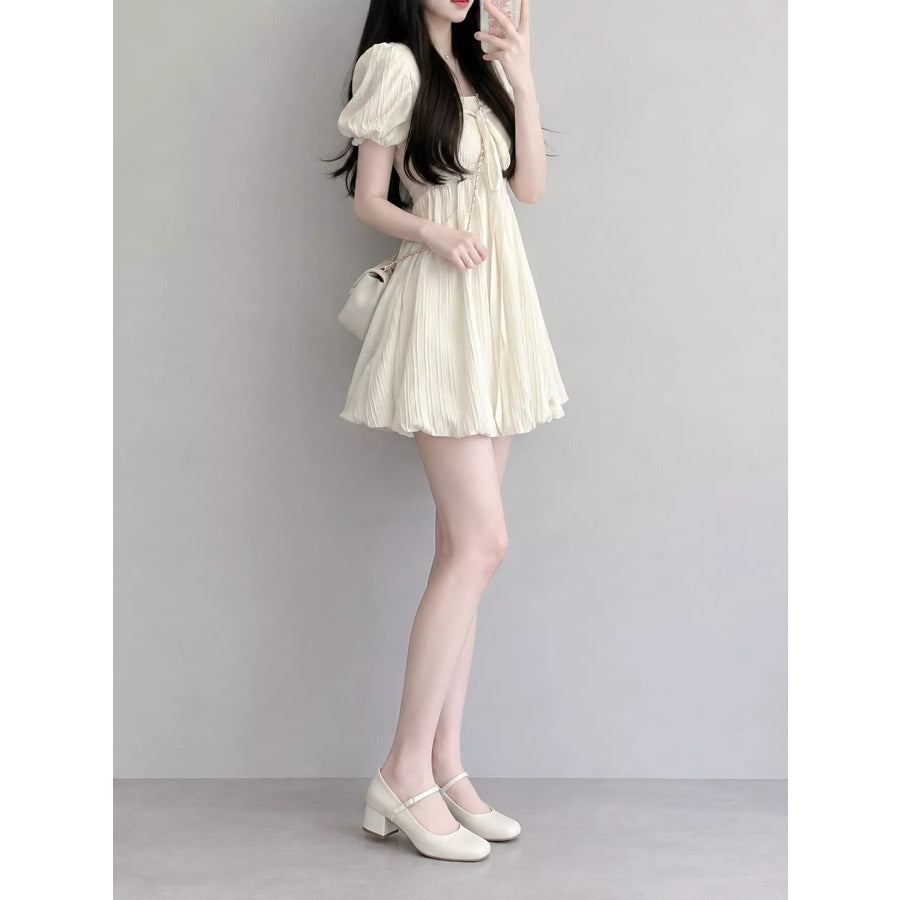 Puff-Sleeve Smocked Mini Dress with Tie-Front Detail Cream / S Apparel and Accessories