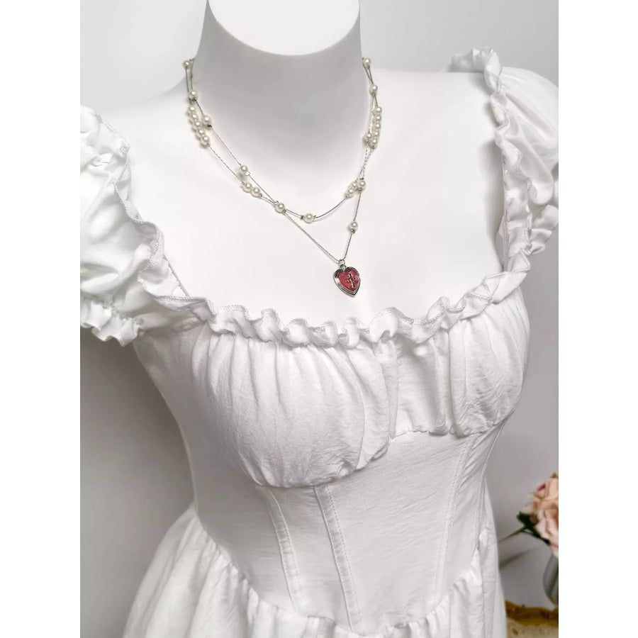 Ruffle Trimmed Layered Mini Dress Apparel and Accessories