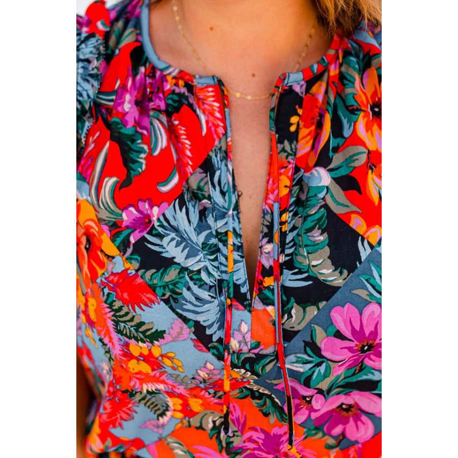 Ruffled Printed Tie Neck Short Sleeve Blouse Floral / S Apparel and Accessories