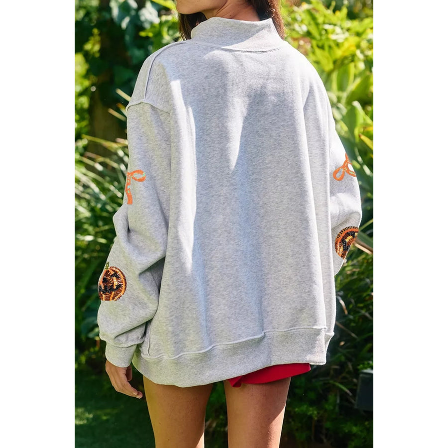 Sequin Pumpkin Face Bow Exposed Seam Halloween Sweatshirt Apparel and Accessories