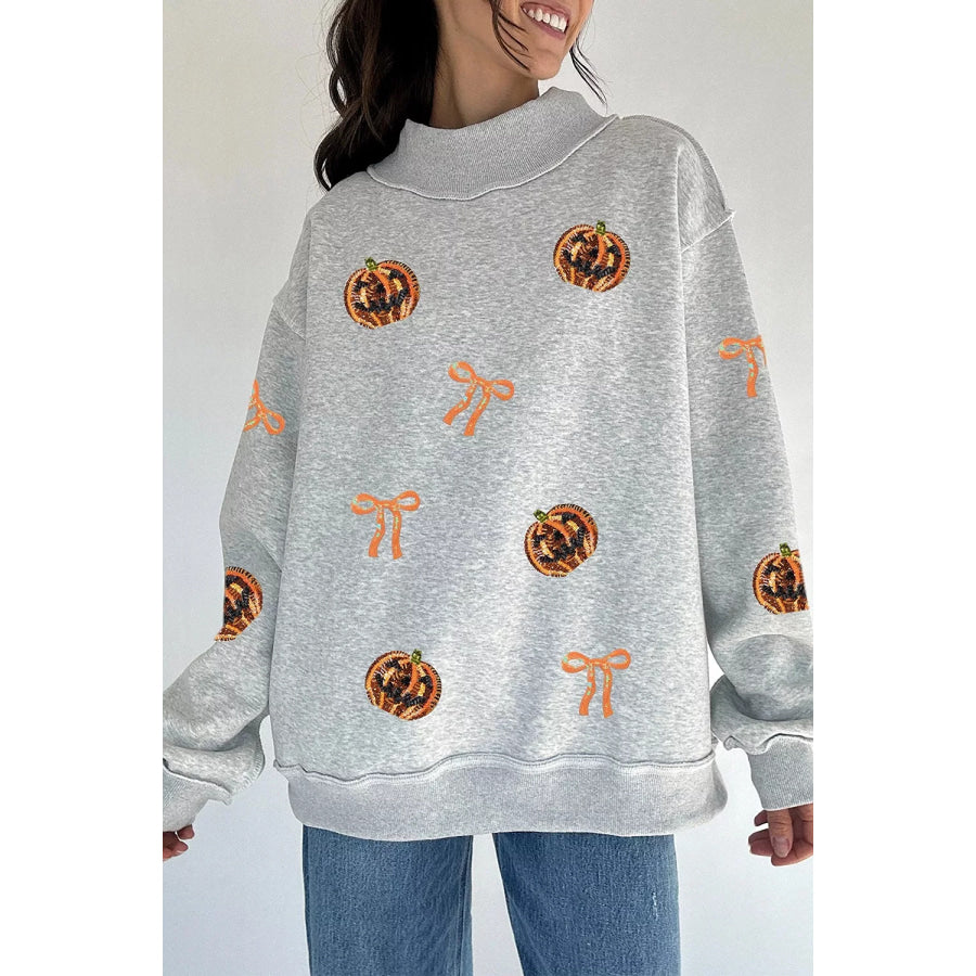Sequin Pumpkin Face Bow Exposed Seam Halloween Sweatshirt Light Gray / S Apparel and Accessories